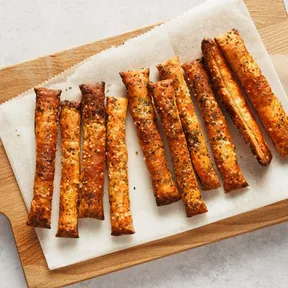 Photo of easy vegetable cheesy sticks on a serving board