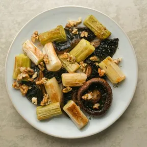 Photo of leeks with portobello and a dressing of walnuts, lemon and thyme