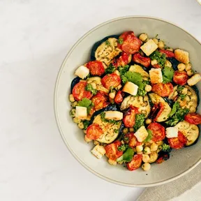 Vegan salad with chickpeas and grilled vegetables on a plate