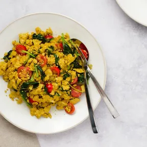 Scrambled tofu with cherry tomatoes and spinach