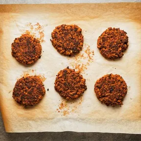 Photo of 6 fried veggie burgers made from soy chunks and kidney beans