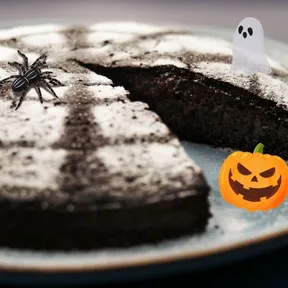 Photo of vegan chocolate cake decorated for Halloween