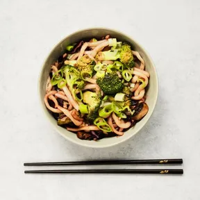 Photo of Yakisoba with broccoli, mushrooms and red cabbage